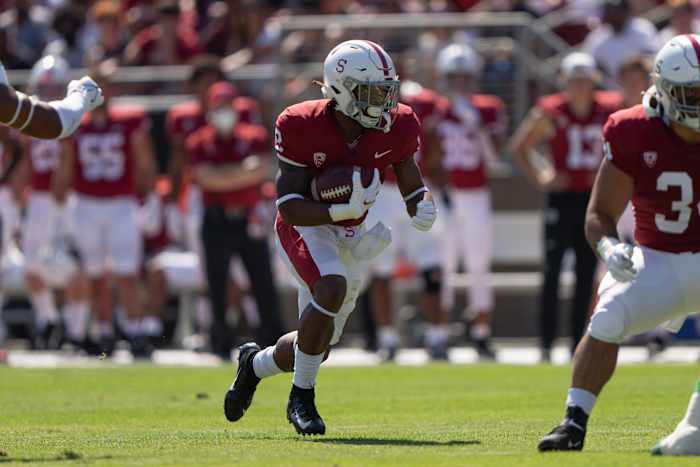 Stanford Cardinal running back Casey Filkins (2) runs with the ball during the first quarter against the Oregon Ducks at Stanford Stadium.